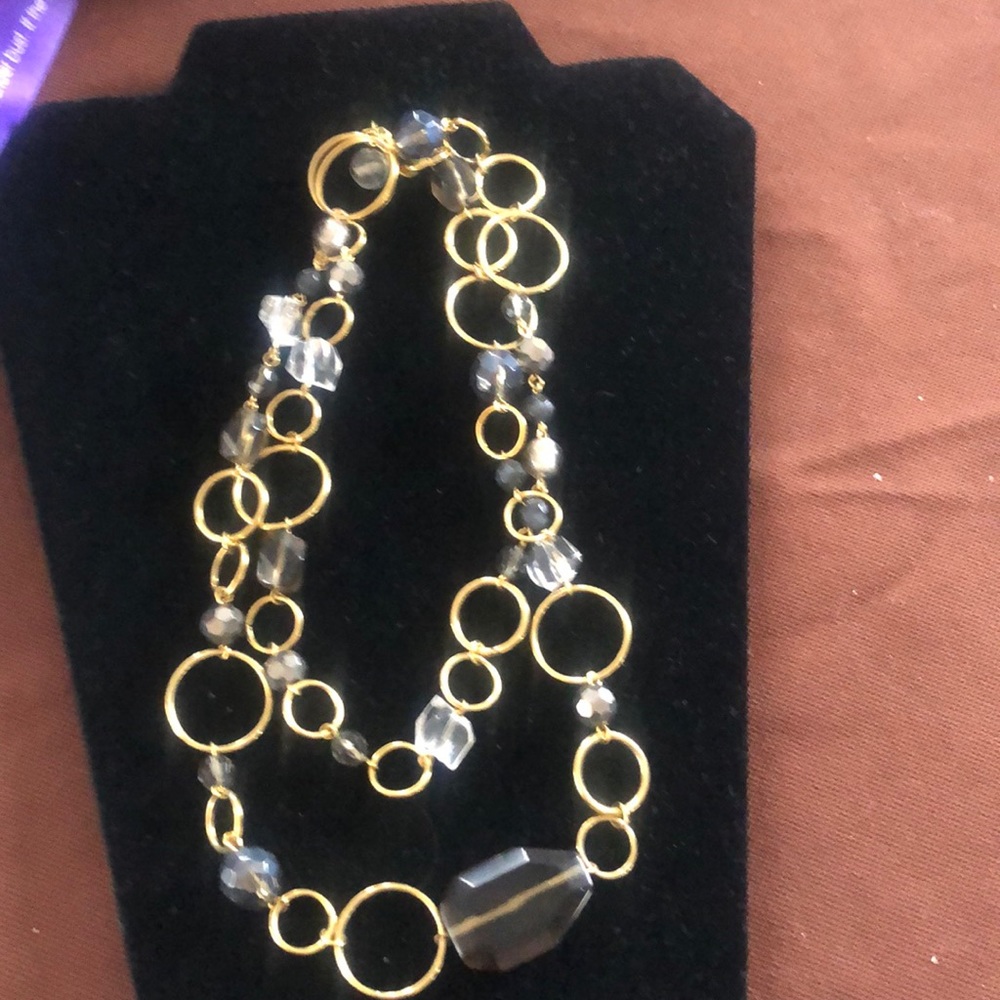 Goldtone metal and stone long necklace